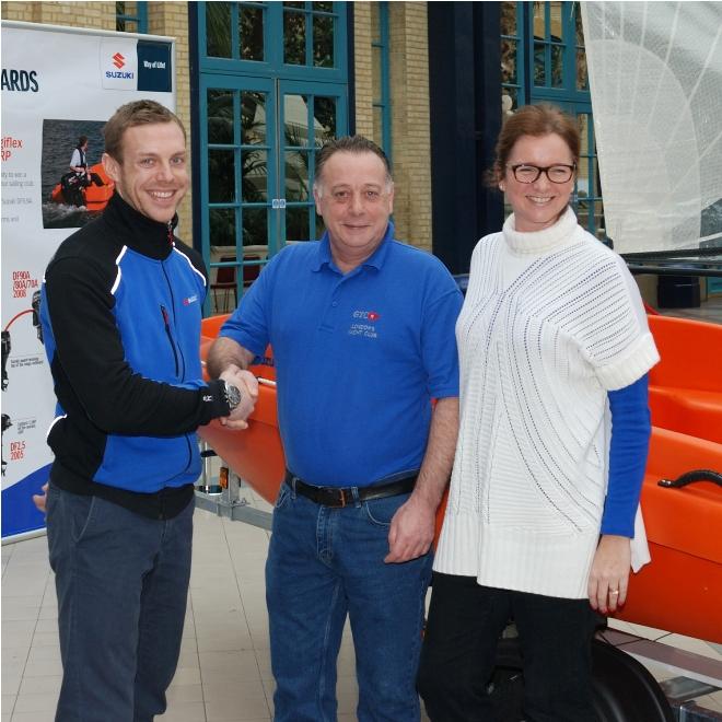 Competition winner Les McKee of GYC (centre), with George Cheeseman, Sales and Marketing Manager, Suzuki Marine and Sarah Tresseder, RYA Chief Exec  - RYA Dinghy Show © Clive Reffell http://www.photoboxgallery.com/ahoythere